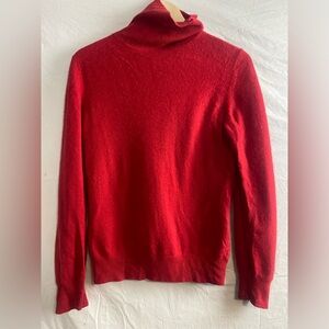 Red cashmere turtleneck sweater